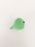 Colourful Mini Dino Amigurumi Pattern step 4 - final assembly and finishing