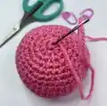 Dragonfruiteratops Amigurumi Pattern step 4 - final assembly and finishing