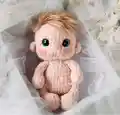 Baby Doll Amigurumi Pattern step 4 - final assembly and finishing