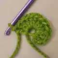 Frog Granny Square Amigurumi Pattern step 4 - final assembly and finishing